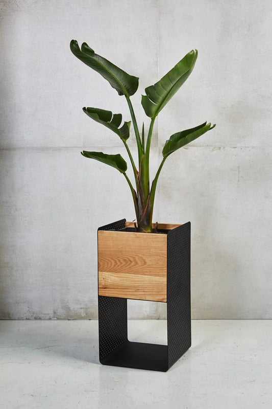 modern wood planter with a black metal stand/frame.